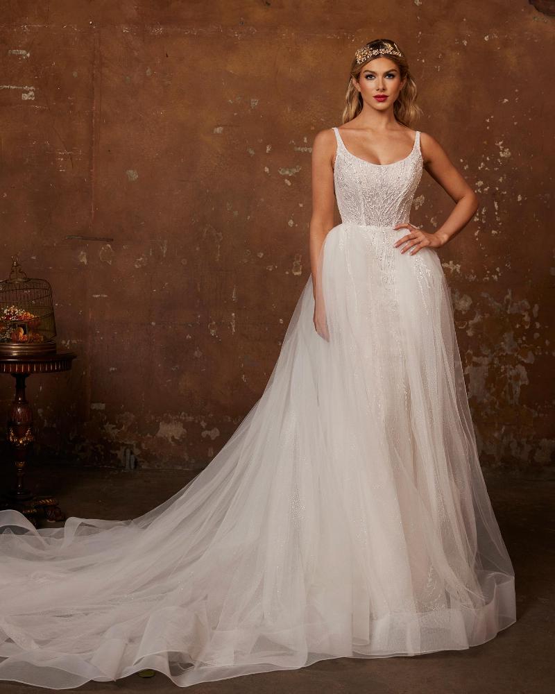 122233 sparkly wedding dress with overskirt and fitted sheath silhouette5